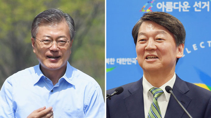 2017韓国大統領選「共に民主党」の文在寅候補(左)と「国民の党」の安哲秀候補(右)=20170415　写真提供：共同通信社