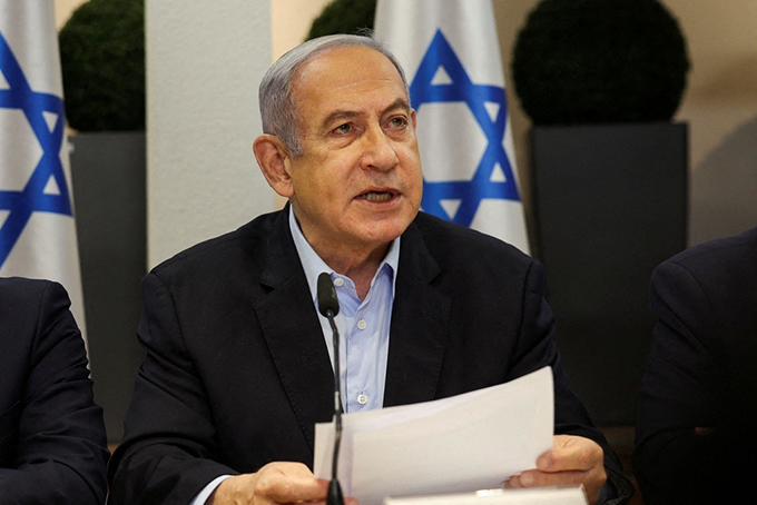 閣議で発言するイスラエルのネタニヤフ首相＝2024年1月7日、テルアビブ（ロイター＝共同）　写真提供：共同通信社